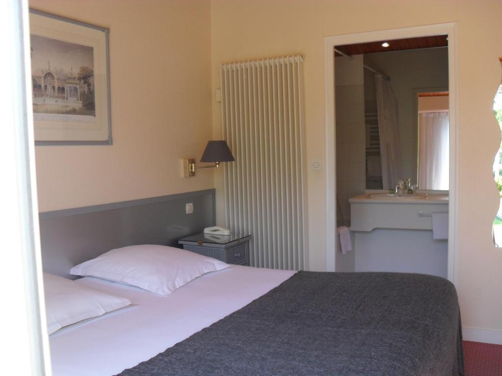 Logis Hotel Val De Vienne Le Vigeant Cameră foto